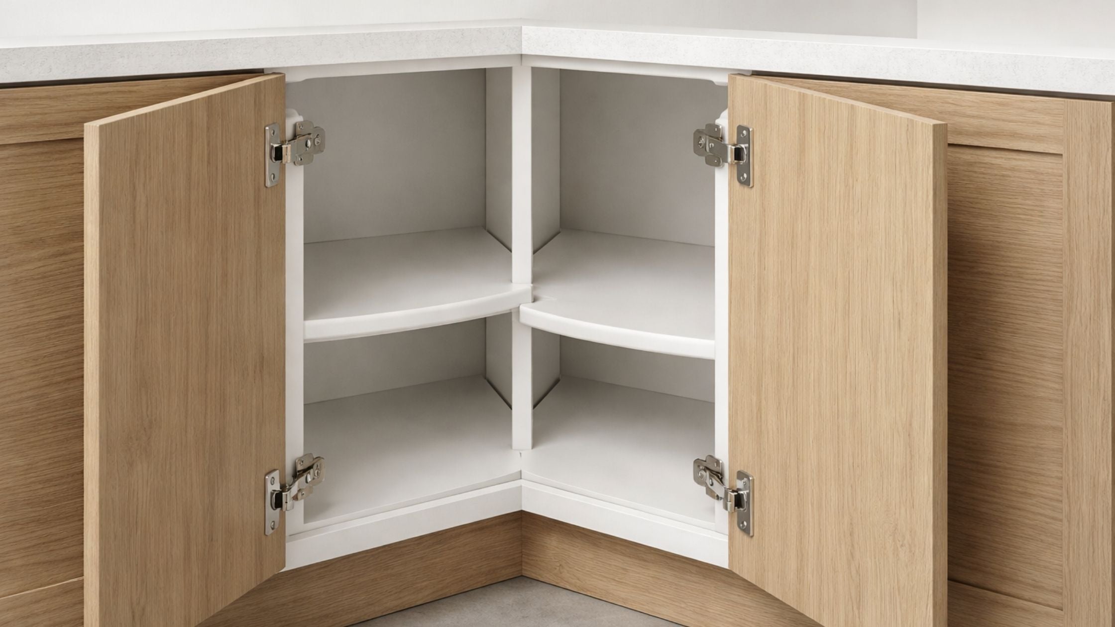 Lazy Susan cabinet with corner doors open showing concealed Lazy Susan hinges and rotating interior shelves