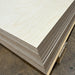 Stack of B/BB Baltic Birch plywood 4×8 panels in 3/4-inch thickness showing the layered Baltic birch edges.