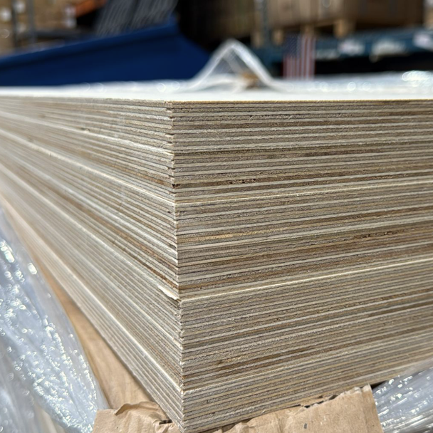 Stack of Baltic Birch Plywood BB/BB sheets showing uniform multi-ply layers and clean edge grain, ideal for cabinets and furniture.