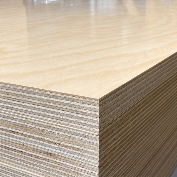 Detailed corner view of 3/4-inch prefinished Baltic birch plywood with natural veneer and visible multi-ply edges.