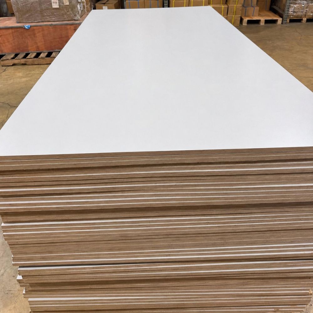 Light gray prefinished plywood with straight factory edges and a smooth finish.