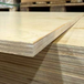 Prefinished Birch Plywood 4x8 sheet showing durable layered birch edge and glossy protective finish