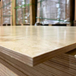 Stack of Prefinished Birch Plywood 4x8 sheets highlighting smooth UV finish and strong multi-ply birch core
