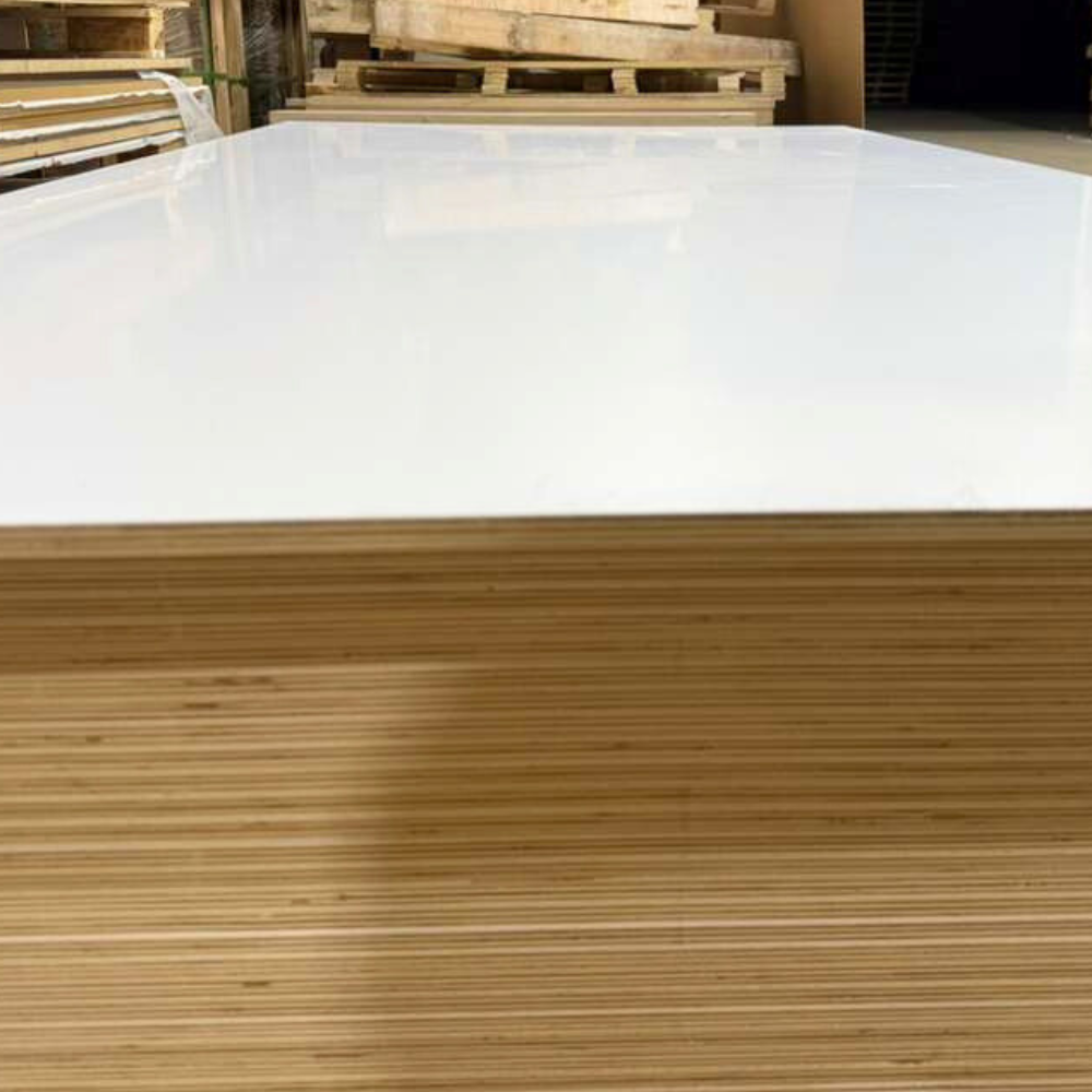 Stack of Prefinished White Melamine Plywood 4x8 sheets with glossy white surface and uniform layered birch core
